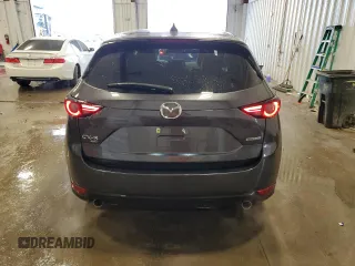 2021 Mazda CX-5 Grand Touring with VIN JM3KFBDM6M0478372, listed as a Copart auction lot 43797295 with 31,763 mi miles and Salvage Title. Bid and sale history available at carsss.com. Image 6.