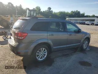 2013 Dodge Journey SXT with VIN 3C4PDCBG0DT522408, listed as a Copart auction lot 62699195 with 130,665 mi miles and Salvage title. Bid and sale history available at DreamBid. Image 3.