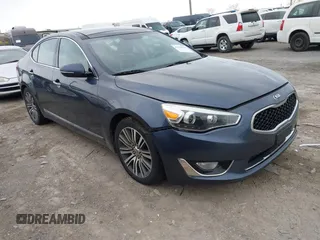 2014 Kia Cadenza Premium with VIN KNALN4D74E5125829, listed as a IAAI auction lot 41244172 with 167,617 mi miles. Bid and sale history available at carsss.com. Image 1.