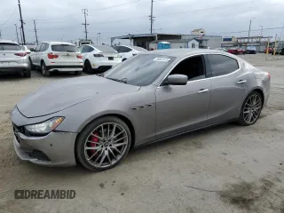 2016 Maserati Ghibli S Q4 z VIN ZAM57RTA6G1172334, wystawiony jako Copart lot #56601575 z przebiegiem 109 524 mil mil oraz Szkody całkowita. Historia ofert i sprzedaży dostępna na DreamBid. Obrazek 1.