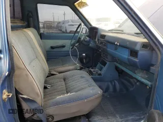 1982 Datsun 720 z VIN JN6SD01SXCW102918, wystawiony jako Copart lot #51125715 z przebiegiem 226 428 mil mil oraz Tytuł czysty. Historia ofert i sprzedaży dostępna na DreamBid. Obrazek 10.