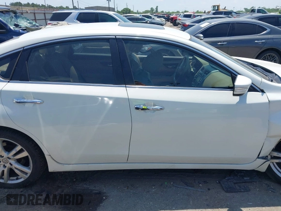 2013 Nissan Altima SV with VIN 1N4BL3AP7DN523429, listed as a IAAI auction lot 42016429 with 188,953 mi miles and . Bid and sale history available at DreamBid. Image 13.