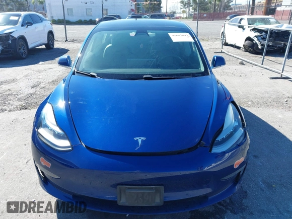 2019 Tesla Model 3 Mid Range with VIN 5YJ3E1EA8KF436086, listed as a IAAI auction lot 41682093 with 70,332 mi miles and . Bid and sale history available at DreamBid. Image 12.