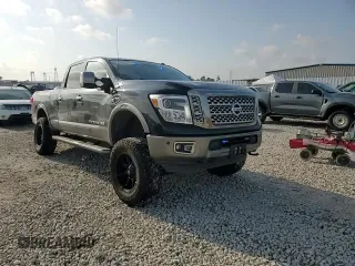 2017 Nissan Titan Platinum Reserve with VIN 1N6BA1F43HN568650, listed as a Copart auction lot 59593525 with 126,193 mi miles and Salvage title. Bid and sale history available at DreamBid. Image 13.