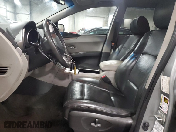 2006 Subaru Tribeca 5-Pass with VIN 4S4WX82C964426570, listed as a Copart auction lot 82098704 with 180,259 mi miles and Salvage title. Bid and sale history available at DreamBid. Image 7.