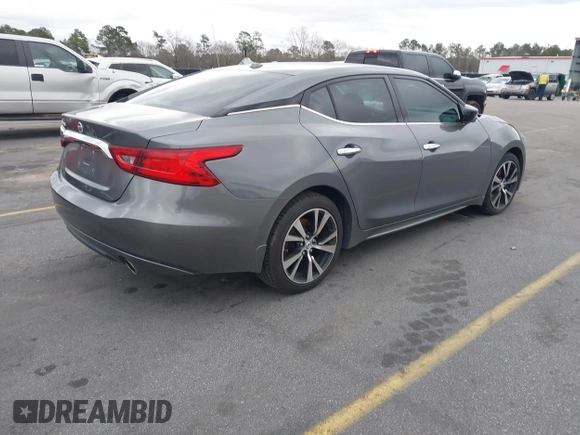 2018 Nissan Maxima SV with VIN 1N4AA6APXJC400203, listed as a IAAI auction lot 41617771 with 107,366 mi miles and . Bid and sale history available at DreamBid. Image 4.