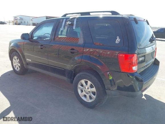 2008 Mazda Tribute Grand Touring with VIN 4F2CZ02Z28KM14136, listed as a IAAI auction lot 41878738 with 155,465 mi miles. Bid and sale history available at carsss.com. Image 3.