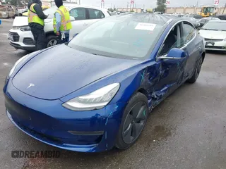 2020 Tesla Model 3 Standard Range Plus with VIN 5YJ3E1EAXLF644679, listed as a IAAI auction lot 41500595 with 53,726 mi miles and . Bid and sale history available at DreamBid. Image 19.