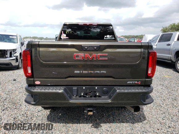 2023 GMC Sierra 3500HD AT4 z VIN 1GT49VEY3PF127108, wystawiony jako Copart lot #57052823 z przebiegiem 9915 mil mil oraz Szkody całkowita. Historia ofert i sprzedaży dostępna na DreamBid. Obrazek 6.