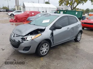 2013 Mazda Mazda2 Sport with VIN JM1DE1KY6D0170767, listed as a IAAI auction lot 41761689 with 142,743 mi miles. Bid and sale history available at carsss.com. Image 2.