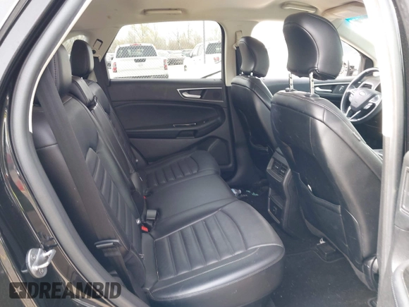 2015 Ford Edge SEL with VIN 2FMTK4J88FBB05259, listed as a IAAI auction lot 42043247 with 128,987 mi miles. Bid and sale history available at carsss.com. Image 8.