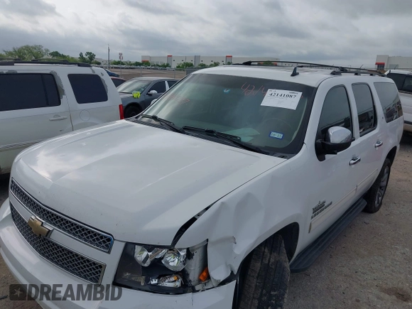 2011 Chevrolet Suburban LT with VIN 1GNSCJE05BR392834, listed as a IAAI auction lot 42141087 with 251,359 mi miles and . Bid and sale history available at DreamBid. Image 17.