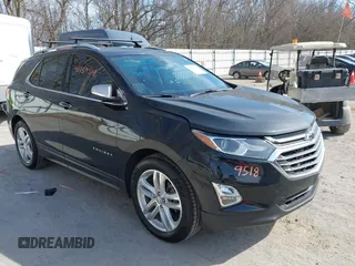 2018 Chevrolet Equinox Premier with VIN 2GNAXWEX8J6236596, listed as a IAAI auction lot 41759518 with 116,942 mi miles and . Bid and sale history available at carsss.com. Image 1.