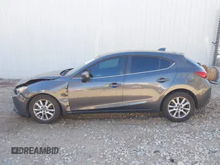 2014 Mazda 3 i Grand Touring with VIN JM1BM1M77E1119529, listed as a IAAI auction lot 41399739 with 126,931 mi miles and . Bid and sale history available at DreamBid. Image 15.
