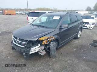 2017 Dodge Journey SXT with VIN 3C4PDDBG5HT618563, listed as a IAAI auction lot 42015188 with 104,747 mi miles and . Bid and sale history available at DreamBid. Image 17.