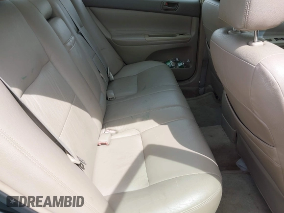 2004 Toyota Camry LE with VIN 4T1BF32KX4U077010, listed as a IAAI auction lot 42039297 with 113,742 mi miles. Bid and sale history available at carsss.com. Image 8.