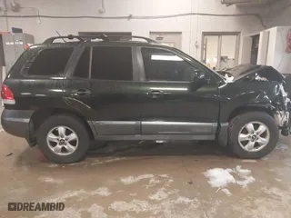 2006 Hyundai Santa Fe GLS with VIN KM8SC13E56U096895, listed as a IAAI auction lot 39109668 with 154,330 mi miles. Bid and sale history available at carsss.com. Image 13.