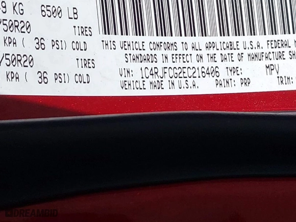2014 Jeep Grand Cherokee Overland with VIN 1C4RJFCG2EC216406, listed as a IAAI auction lot 41944794 with 124,007 mi miles. Bid and sale history available at carsss.com. Image 9.