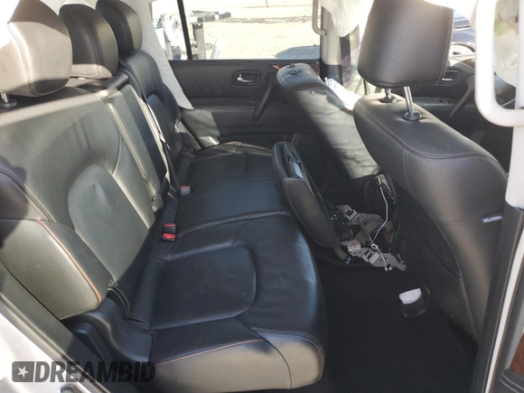 2017 Nissan Armada Platinum z VIN JN8AY2NDXH9010339, wystawiony jako Copart lot #47546625 z przebiegiem Nie podano mil oraz Szkoda całkowita • Salvage title. Historia ofert i sprzedaży dostępna na DreamBid. Obrazek 11.