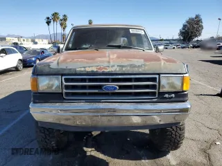 1989 Ford Bronco Custom with VIN 1FMEU15H1KLA71087, listed as a Copart auction lot 89330975 with 98,096 mi miles and Salvage Title. Bid and sale history available at carsss.com. Image 5.