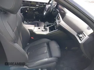 2022 BMW 4 Series 430i xDrive with VIN WBA73AP09NCJ28175, listed as a IAAI auction lot 41486064 with 27,312 mi miles and . Bid and sale history available at DreamBid. Image 5.