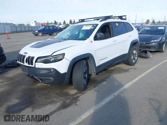 2019 Jeep Cherokee Trailhawk Elite with VIN 1C4PJMBX7KD410612, listed as a IAAI auction lot 41878935 with 55,163 mi miles. Bid and sale history available at carsss.com. Image 2.