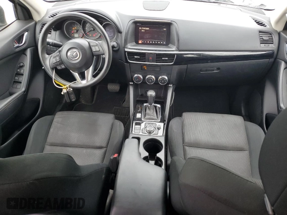 2016 Mazda CX-5 Sport with VIN JM3KE2BY0G0843786, listed as a Copart auction lot 54451275 with 111,363 mi miles and Salvage title. Bid and sale history available at DreamBid. Image 8.