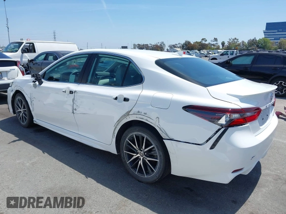 2023 Toyota Camry SE with VIN 4T1G11AK0PU736081, listed as a IAAI auction lot 42090419 with 32,303 mi miles and . Bid and sale history available at DreamBid. Image 3.