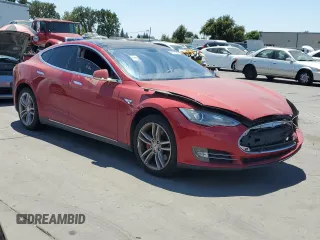 2014 Tesla Model S 60 with VIN 5YJSA1H1XEFP31861, listed as a Copart auction lot 65275815 with Not provided miles and Clean title. Bid and sale history available at DreamBid. Image 4.