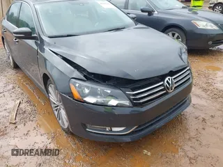 2014 Volkswagen Passat SE z VIN 1VWBT7A39EC097705, wystawiony jako IAAI lot #42447661 z przebiegiem 72 607 mil mil oraz . Historia ofert i sprzedaży dostępna na DreamBid. Obrazek 6.