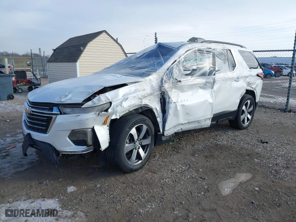 2022 Chevrolet Traverse LT Leather with VIN 1GNEVHKW6NJ130204, listed as a IAAI auction lot 41357252 with 74,938 mi miles. Bid and sale history available at carsss.com. Image 2.