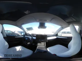 2023 Tesla Model Y Performance with VIN 7SAYGDEF1PF864976, listed as a IAAI auction lot 41667676 with Not Provided miles and . Bid and sale history available at DreamBid. Image 19.