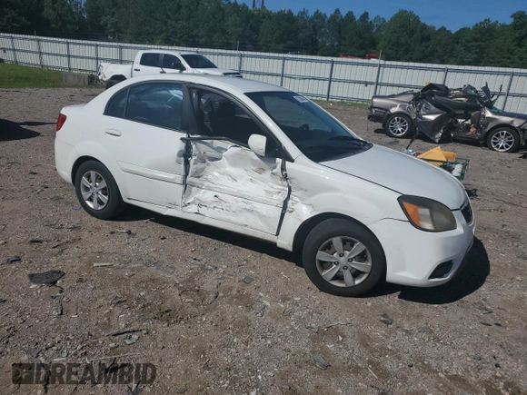 2010 Kia Rio LX with VIN KNADH4A31A6635895, listed as a Copart auction lot 61308434 with 209,016 mi miles and Salvage Title. Bid and sale history available at carsss.com. Image 4.