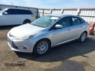 2012 Ford Focus SE with VIN 1FAHP3F24CL178236, listed as a IAAI auction lot 42032272 with 157,373 mi miles and . Bid and sale history available at carsss.com. Image 2.