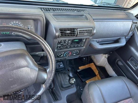 1999 Jeep Wrangler SE with VIN 1J4FY29P0XP413546, listed as a Copart auction lot 50640345 with 79,759 mi miles and Clean Title. Bid and sale history available at carsss.com. Image 9.