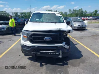 2022 Ford F-150 XL with VIN 1FTFX1E58NFB73477, listed as a IAAI auction lot 42313280 with 18,935 mi miles and . Bid and sale history available at DreamBid. Image 12.