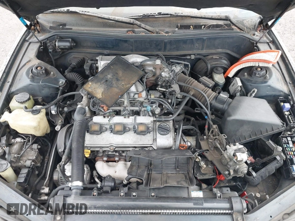 1994 Toyota Camry LE z VIN JT2GK12E1R0036423, wystawiony jako IAAI lot #41922375 z przebiegiem 211 529 mil mil oraz . Historia ofert i sprzedaży dostępna na DreamBid. Obrazek 10.