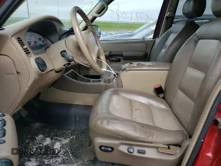 2004 Ford Explorer Sport Trac XLS z VIN 1FMDU77K44UA34720, wystawiony jako Copart lot #55726075 z przebiegiem 192 547 mil mil oraz Szkoda całkowita • Salvage title. Historia ofert i sprzedaży dostępna na DreamBid. Obrazek 7.