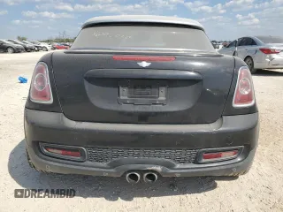 2012 MINI Coupe S z VIN WMWSX3C53CT154716, wystawiony jako Copart lot #71780654 z przebiegiem 101 260 mil mil oraz Szkody całkowita. Historia ofert i sprzedaży dostępna na DreamBid. Obrazek 6.