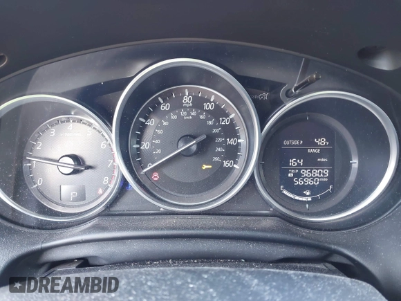 2016 Mazda CX-5 Touring with VIN JM3KE4CY5G0630438, listed as a IAAI auction lot 41877660 with 56,960 mi miles. Bid and sale history available at carsss.com. Image 7.