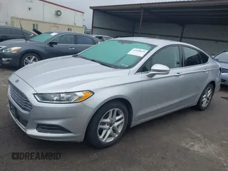 2016 Ford Fusion SE z VIN 3FA6P0H76GR385328, wystawiony jako IAAI lot #42408631 z przebiegiem 127 293 mil mil oraz . Historia ofert i sprzedaży dostępna na DreamBid. Obrazek 2.
