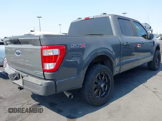 2021 Ford F-150 XL with VIN 1FTEW1CP6MFA09100, listed as a IAAI auction lot 42729047 with 27,593 mi miles and . Bid and sale history available at DreamBid. Image 4.