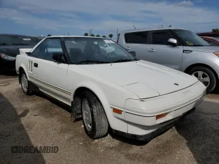 1986 Toyota MR2 z VIN JT2AW15C7G0083196, wystawiony jako Copart lot #74149374 z przebiegiem 30 771 mil mil oraz Nie do naprawy. Historia ofert i sprzedaży dostępna na DreamBid. Obrazek 4.