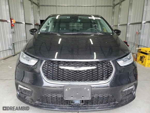 2023 Chrysler Pacifica Hybrid Touring L with VIN 2C4RC1L74PR575358, listed as a Copart auction lot 43261875 with 35,077 mi miles and Clean Title. Bid and sale history available at carsss.com. Image 5.
