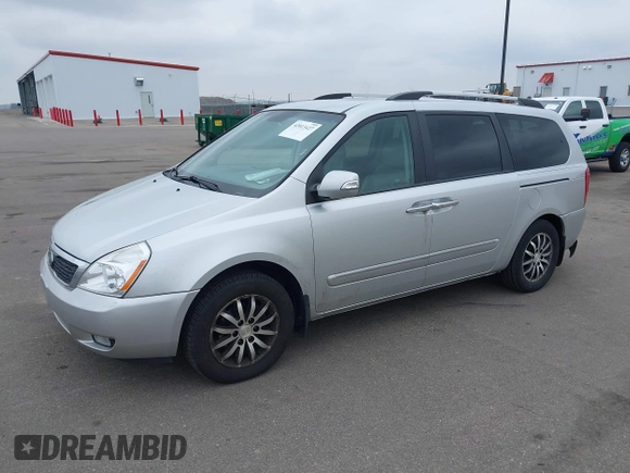 2012 Kia Sedona EX with VIN KNDMH4C78C6431441, listed as a IAAI auction lot 42013427 with 213,147 mi miles. Bid and sale history available at carsss.com. Image 2.