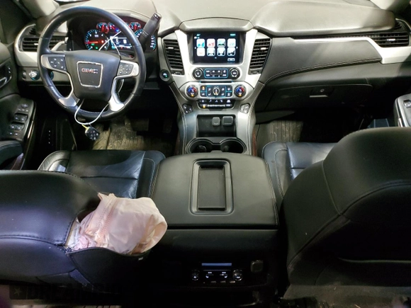 2019 GMC Yukon SLT with VIN 1GKS2BKC6KR387954, listed as a Copart auction lot 44970125 with 97,616 mi miles and Salvage Title. Bid and sale history available at carsss.com. Image 8.
