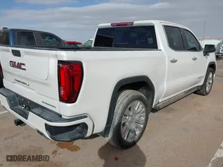 2022 GMC Sierra 1500 Limited Denali with VIN 3GTU9FEL1NG173980, listed as a IAAI auction lot 41569082 with 26,880 mi miles. Bid and sale history available at carsss.com. Image 4.