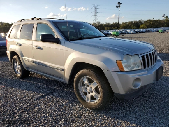 2007 Jeep Grand Cherokee Laredo with VIN 1J8HS48P97C536260, listed as a Copart auction lot 74230594 with 94,313 mi miles and Salvage Title. Bid and sale history available at carsss.com. Image 4.