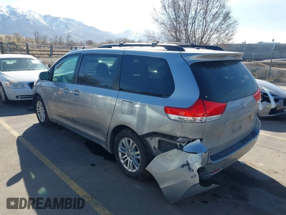 2011 Toyota Sienna XLE AAS with VIN 5TDYK3DC4BS014986, listed as a IAAI auction lot 41763681 with 169,619 mi miles. Bid and sale history available at carsss.com. Image 3.
