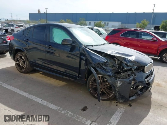 2015 BMW X4 xDrive35i with VIN 5UXXW5C50F0E87728, listed as a IAAI auction lot 41819628 with 136,042 mi miles and . Bid and sale history available at DreamBid. Image 1.